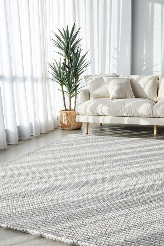 Studio Oskar Felted Wool Striped Rug Grey | Luxury home decor and furniture by Home Decor & Co