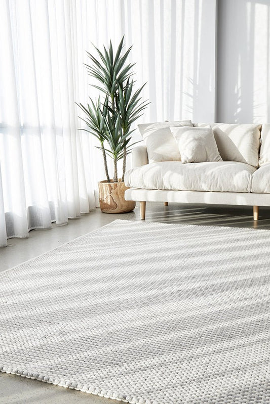 Studio Oskar Felted Wool Striped Rug Grey White | Luxury home decor and furniture by Home Decor & Co